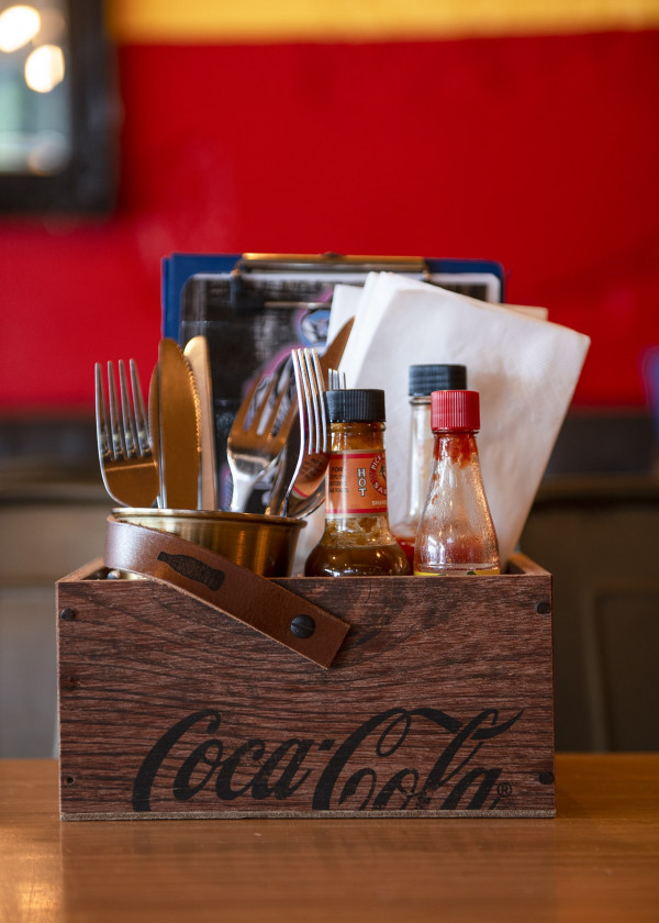 At Nanny’s Eatery, hot sauce can be found on every table.
