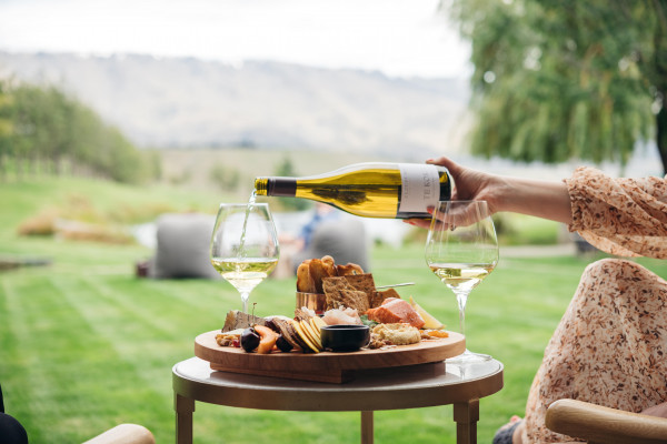 glass of wine being poured at Cloudy Bay Cellar Doors