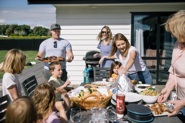 Family hosting a BBQ