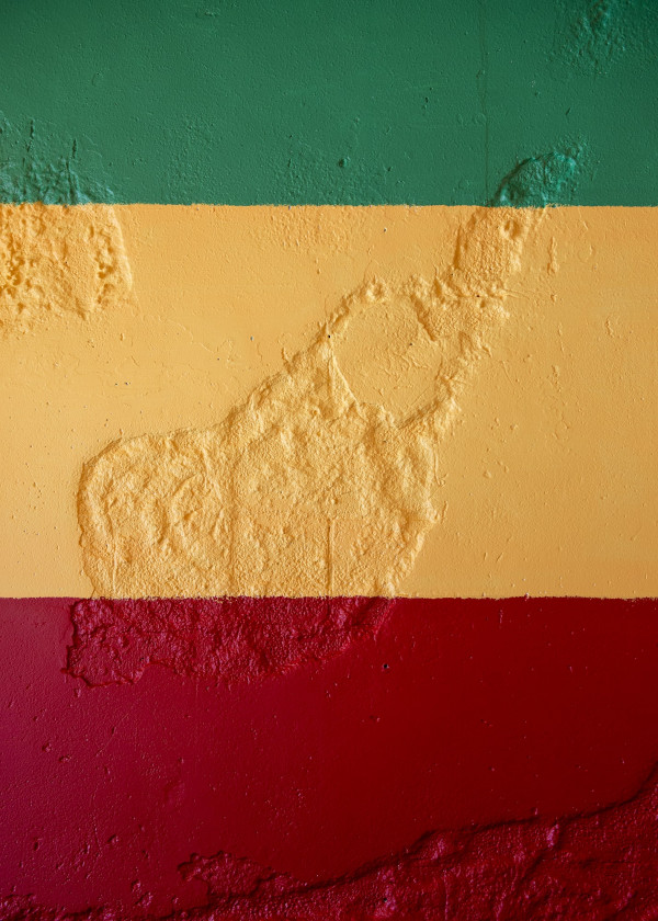 The colours of the Ethiopian flag on a wall at Nanny’s Eatery. The colours of the flag have long been associated with Jamaican Rastafarianism.