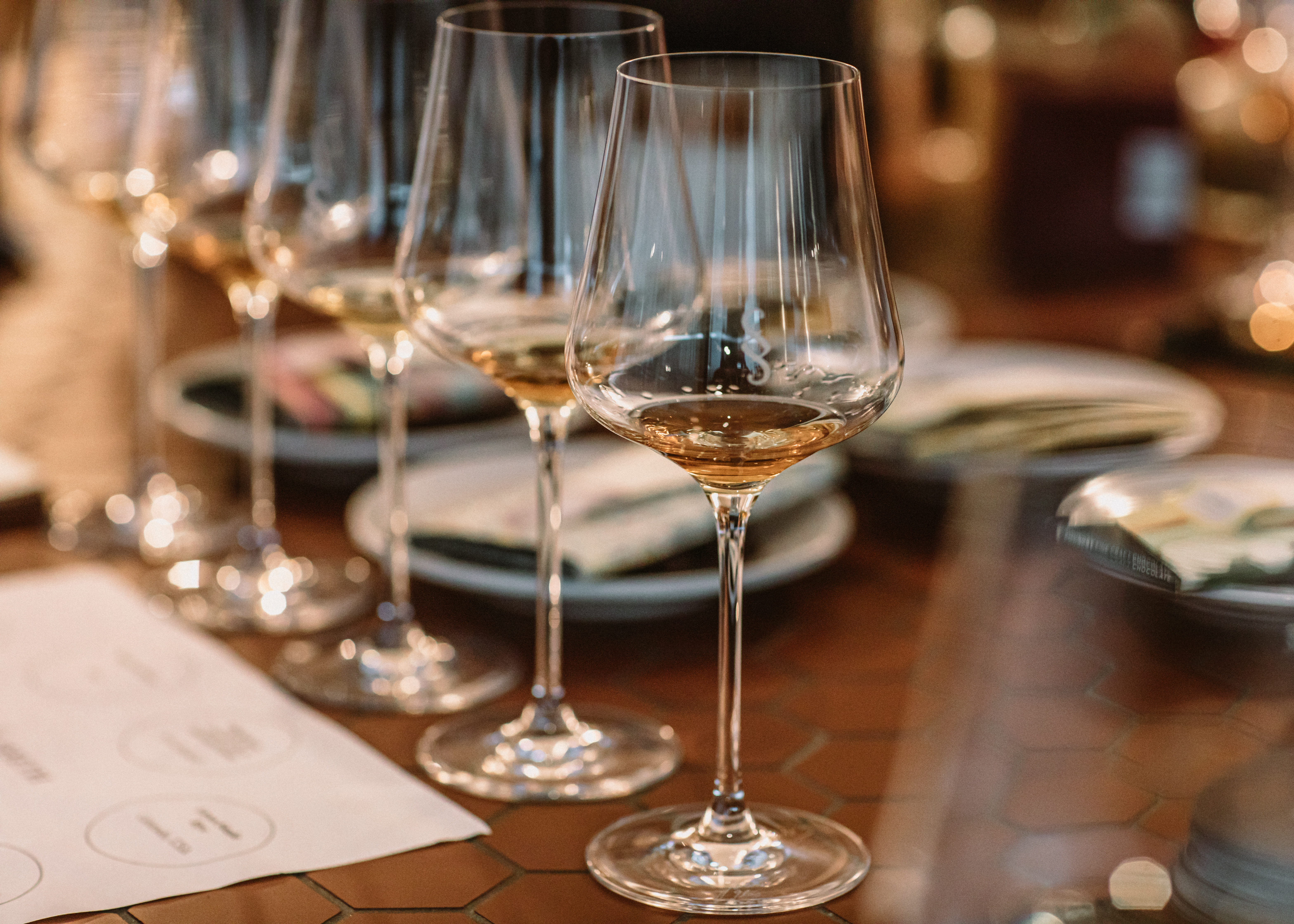 empty wine glasses placed on a table