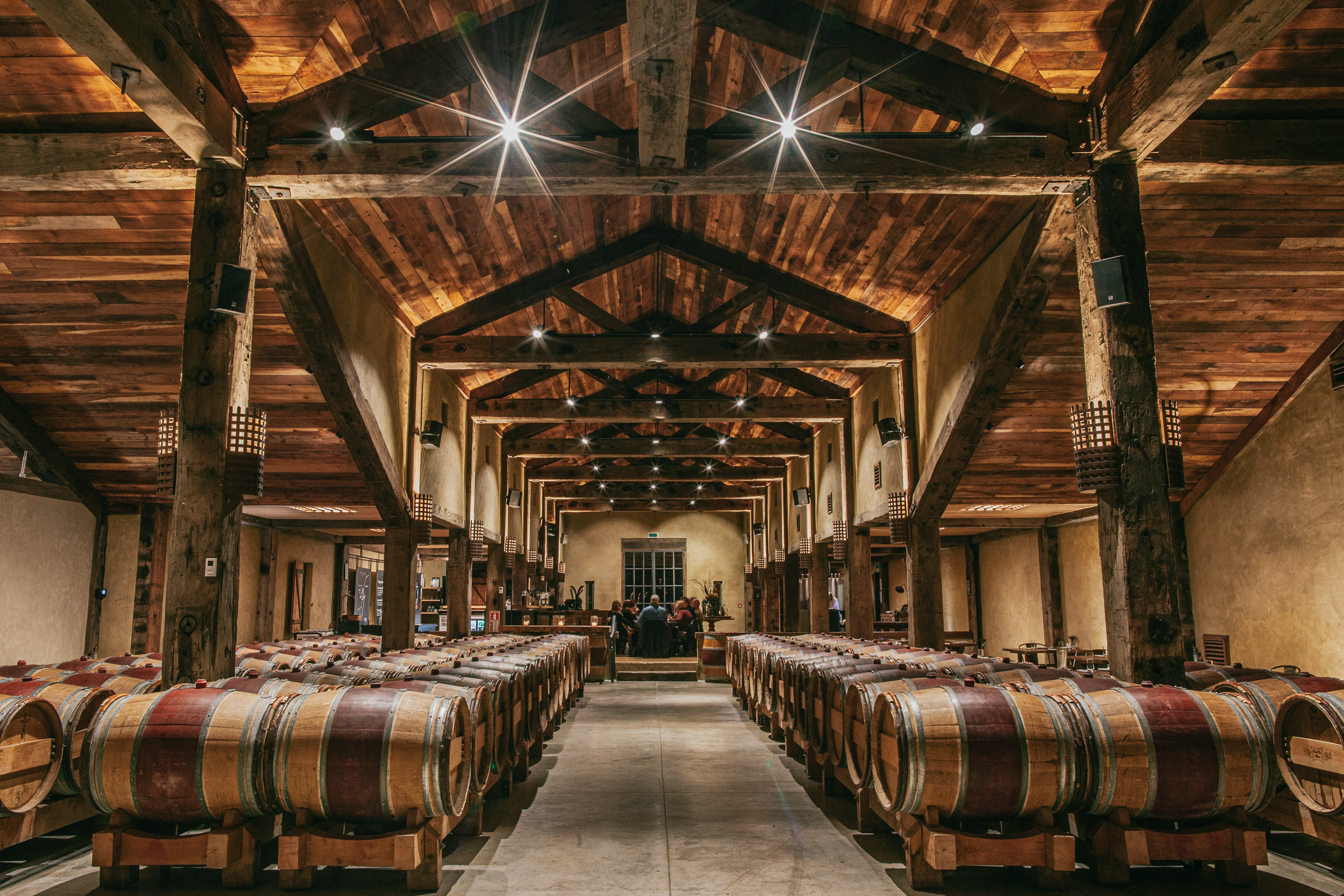 Winery filled with barrels of wine