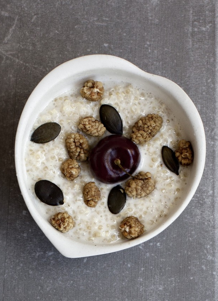 Coconut Quinoa Porridge with Cherries and Seeds