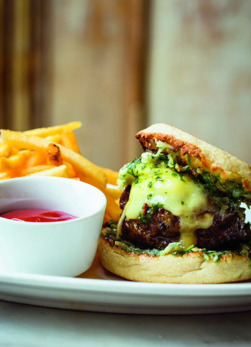 Grilled Hamburger with Cheddar Cheese on Toasted English Muffin with Parsley-Shallot Butter 