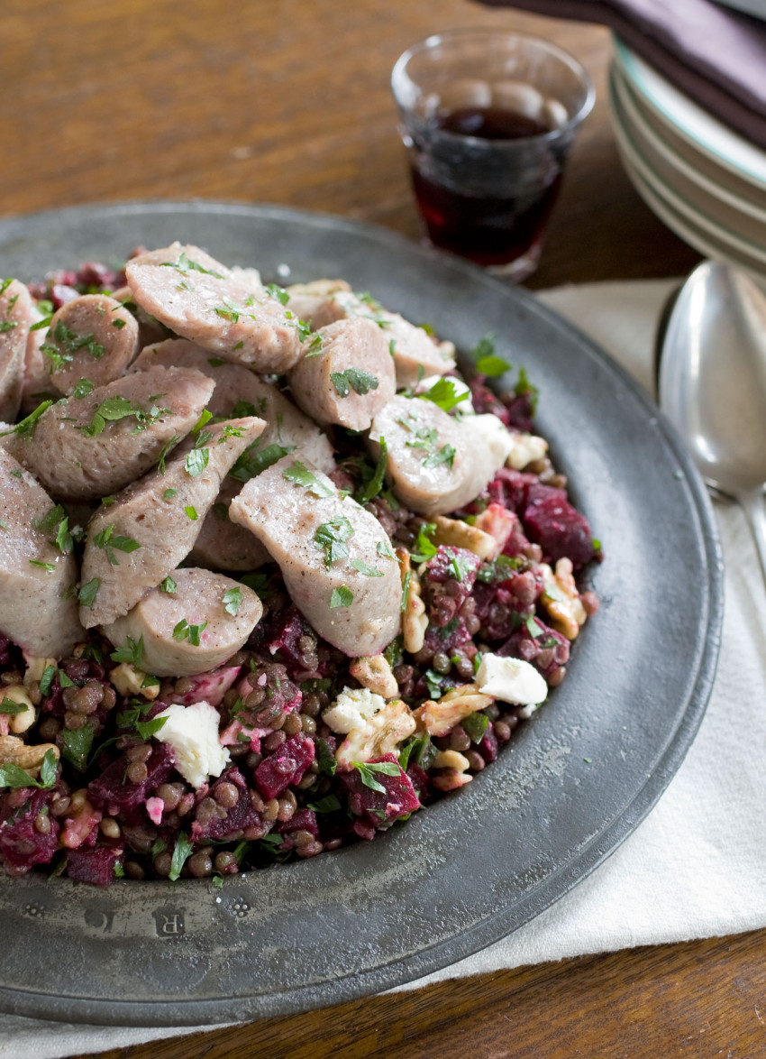 Poached Cotechino with Puy Lentil, Beetroot and Goats Cheese Salad
