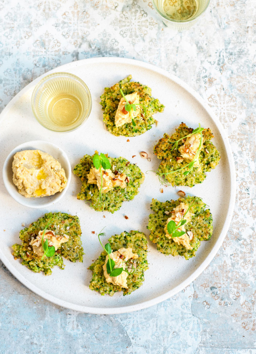 Green Herb Millet and Feta Fritters with Garlic Hummus, Roasted Almonds and Pea Shoots