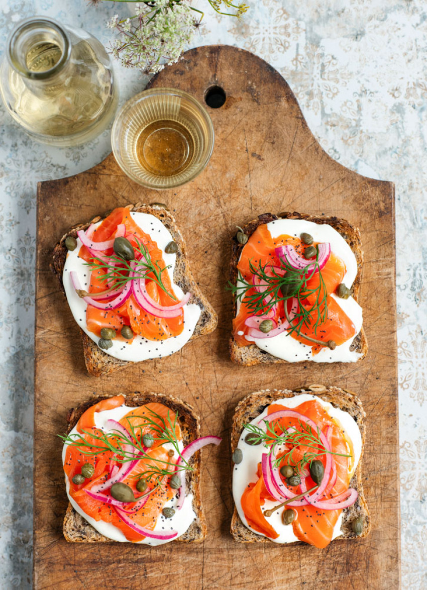 Grainy Bread Toasts with Ricotta Feta Whip, Smoked Salmon, Quick Pickled Red Onion and Capers